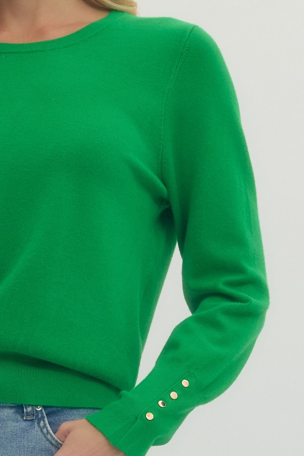 Solid Round Neck Long Sleeve Top Featuring Button Detail At Cuffs.