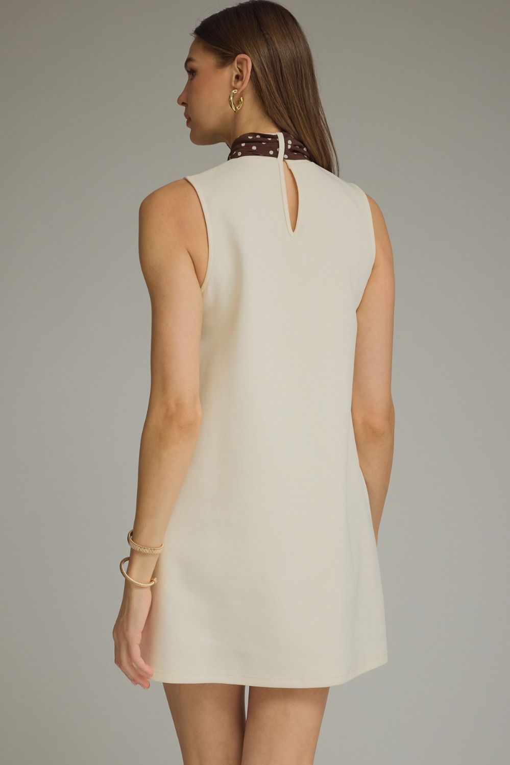Solid Sleeveless Mini Dress Featuring Self-tie Neck Scarf Detail.