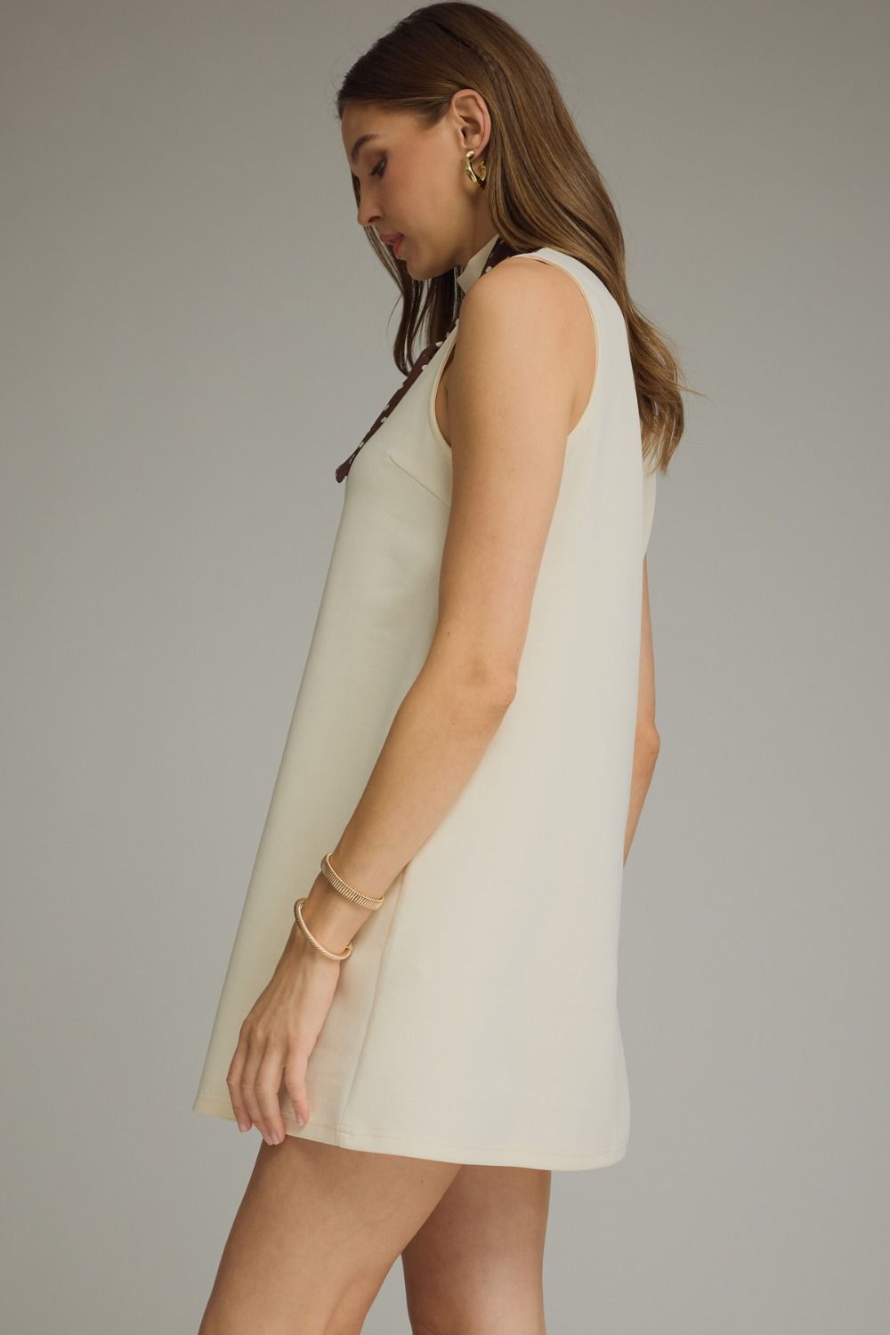 Solid Sleeveless Mini Dress Featuring Self-tie Neck Scarf Detail.